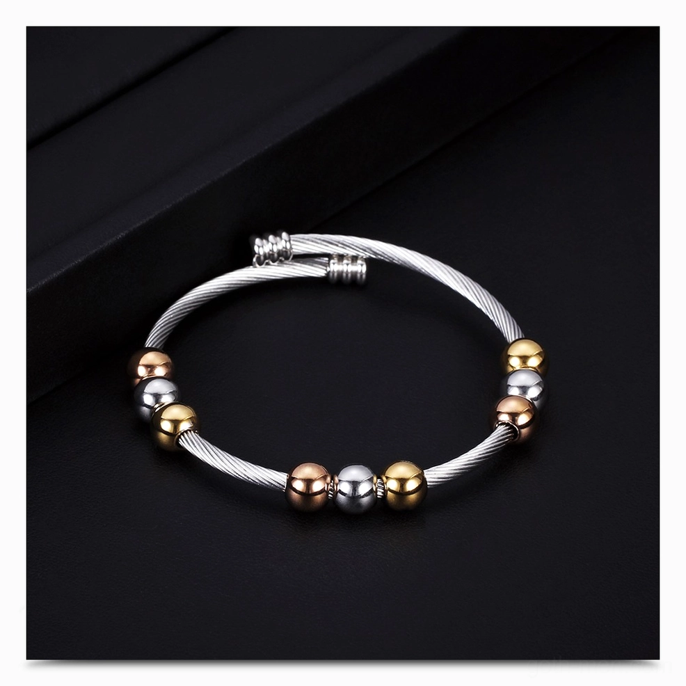Gold and silver gothic bracelet three-quarter flat view alternative angle