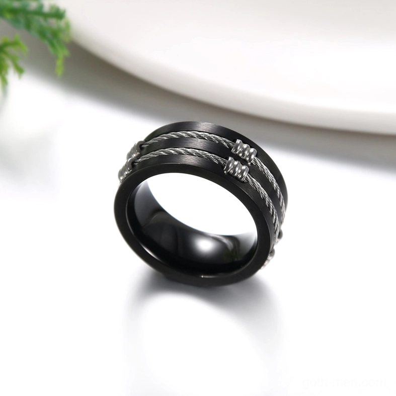 Black industrial stainless steel cable ring 3/4 oblique view with silver hardware accents