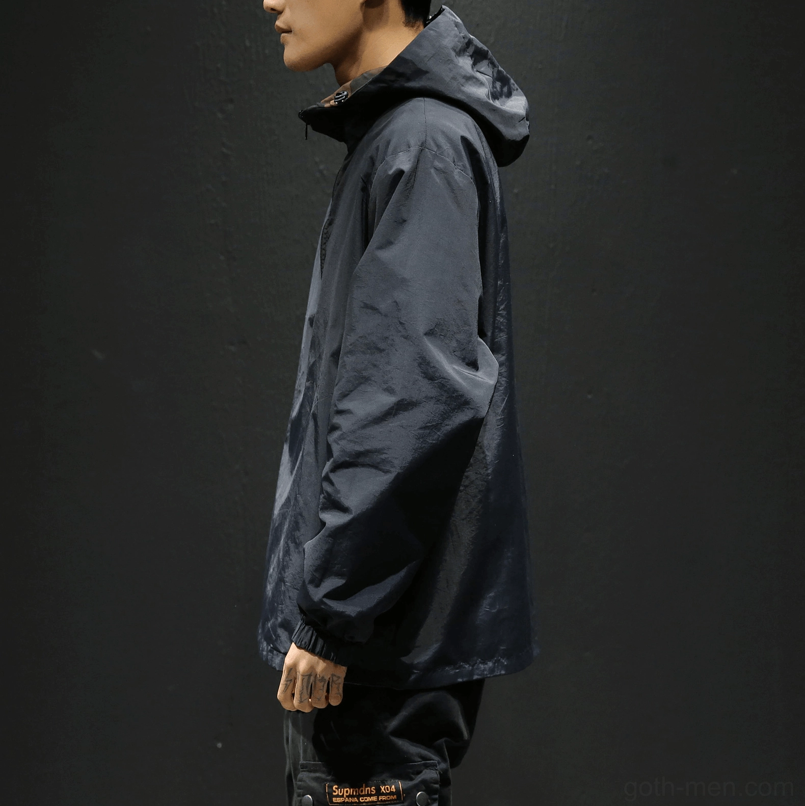Close-up detail of men's gothic camo hoodie showing half-zip placket and fabric texture