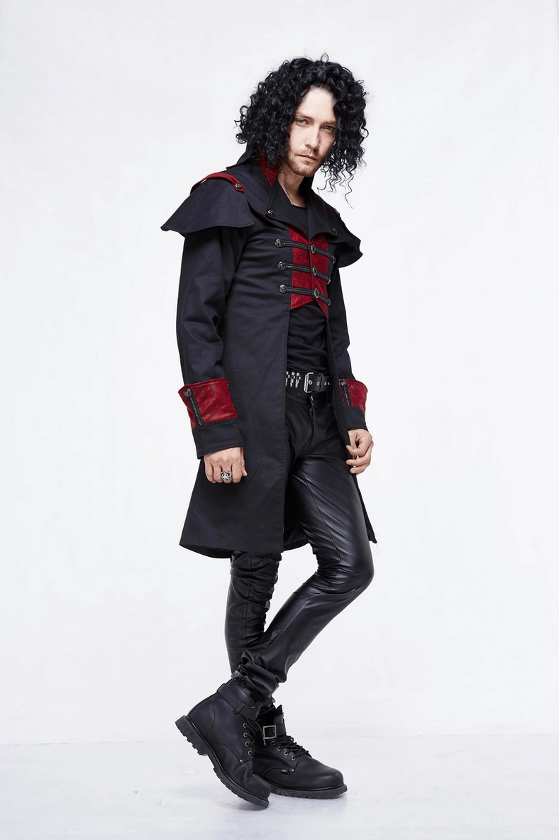 Gothic black and red military cape coat detail showing red front panel, metal hardware, and stand collar construction