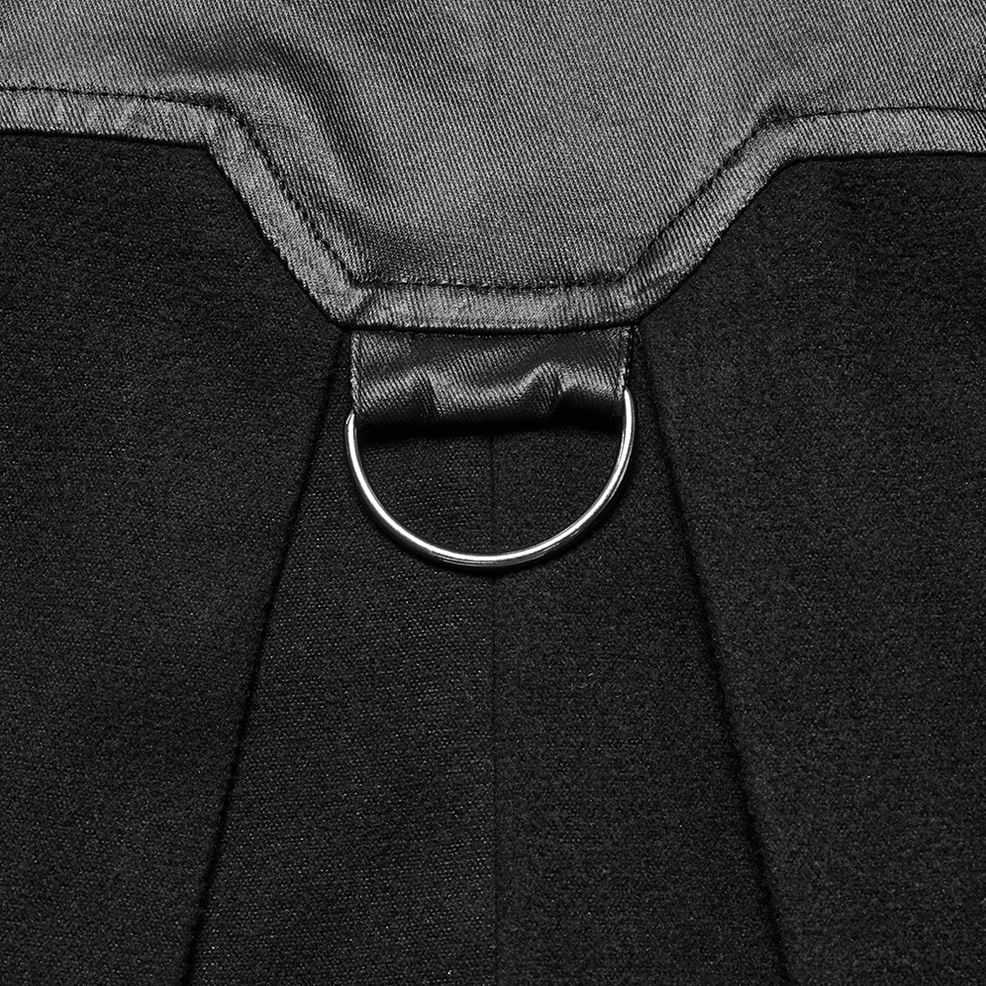 Close-up top view of matte black fabric texture with leather trim on D-ring hardware