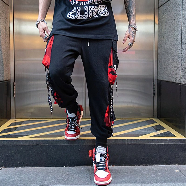 Black gothic cargo joggers bottom cuff detail displaying tapered hem construction and fabric weight