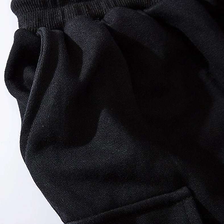 Black gothic cargo joggers side waist detail showing wrinkled ribbed knit material and construction quality