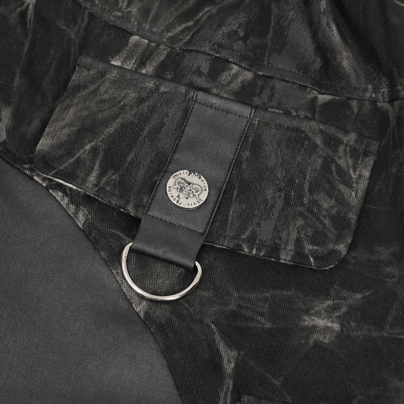 Close-up detail of black gothic cargo joggers cargo pocket with metal D-ring and embossed logo button
