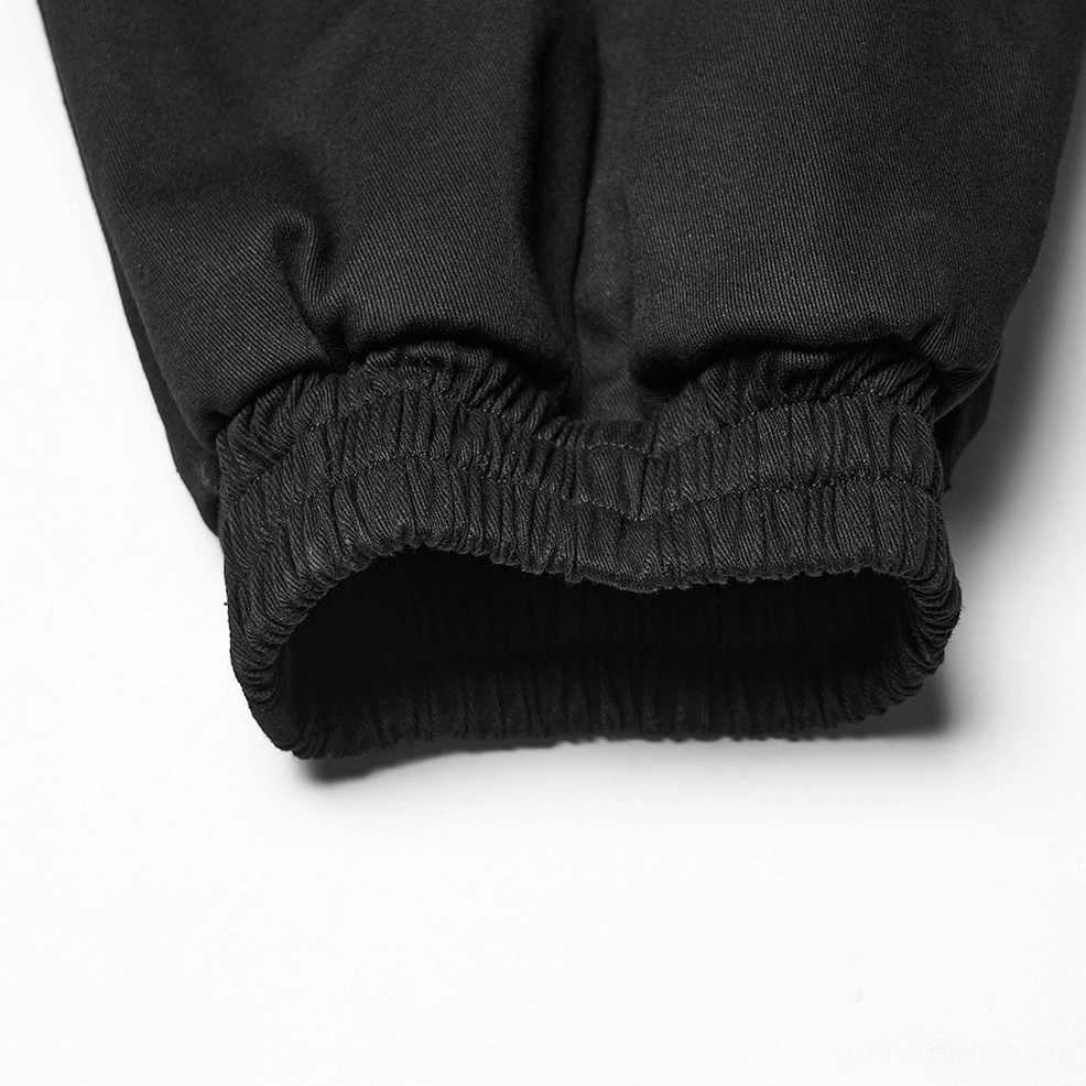 Close-up of black gothic cargo pants ankle cuff showing elasticated twill woven fabric