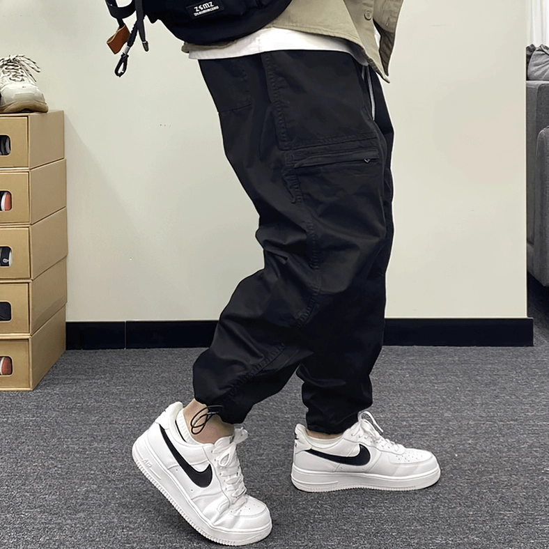 Gothic cargo harem pants overall back and side profile showcasing relaxed silhouette and functional design elements