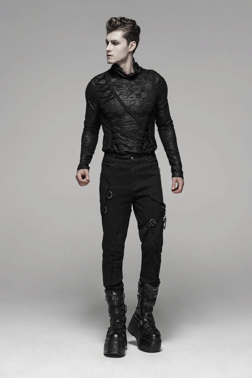 Black Gothic cargo pants showing distressed knee weathering and textile construction