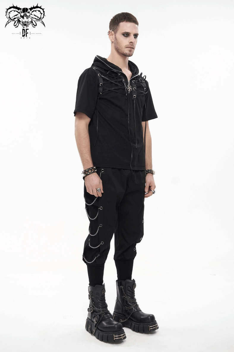 Texture and weave detail of black matte cotton-spandex fabric used in gothic cargo pants