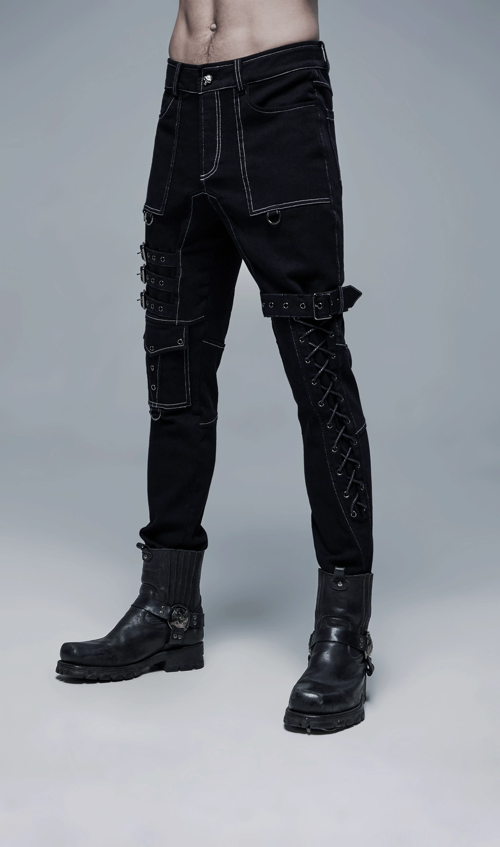 Gothic cargo pants detail view of contrast white stitching and structural buckle placement