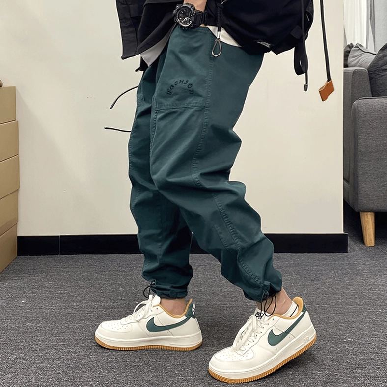 Gothic harem cargo pants waistband and drawstring toggle detail showcasing premium finish and functional design