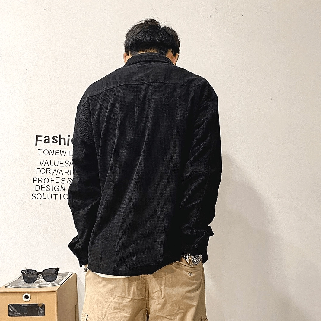Male model wearing oversized gothic cargo shirt with multiple layers, demonstrating versatile styling options for cyberpunk and alternative fashion expressions
