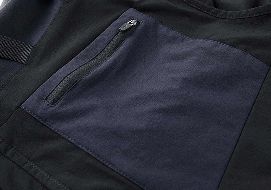 Gothic cargo shorts front pocket - zippered utility pocket detail with color-block fabric