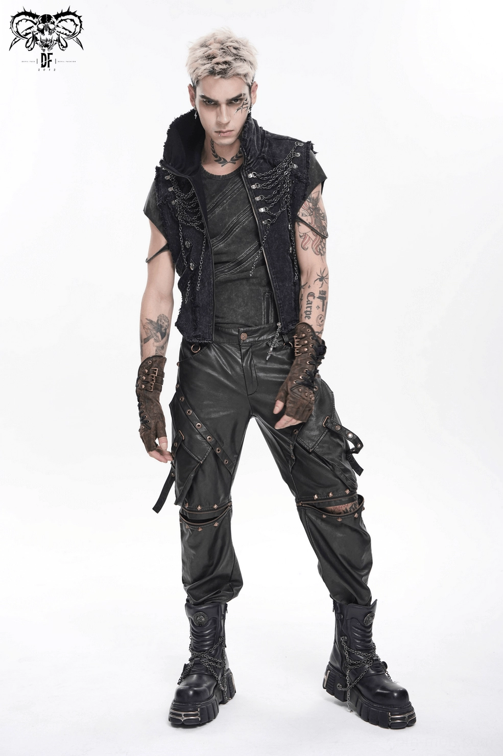 Dynamic pose of black gothic chain vest worn on male model displaying movement and fabric drape
