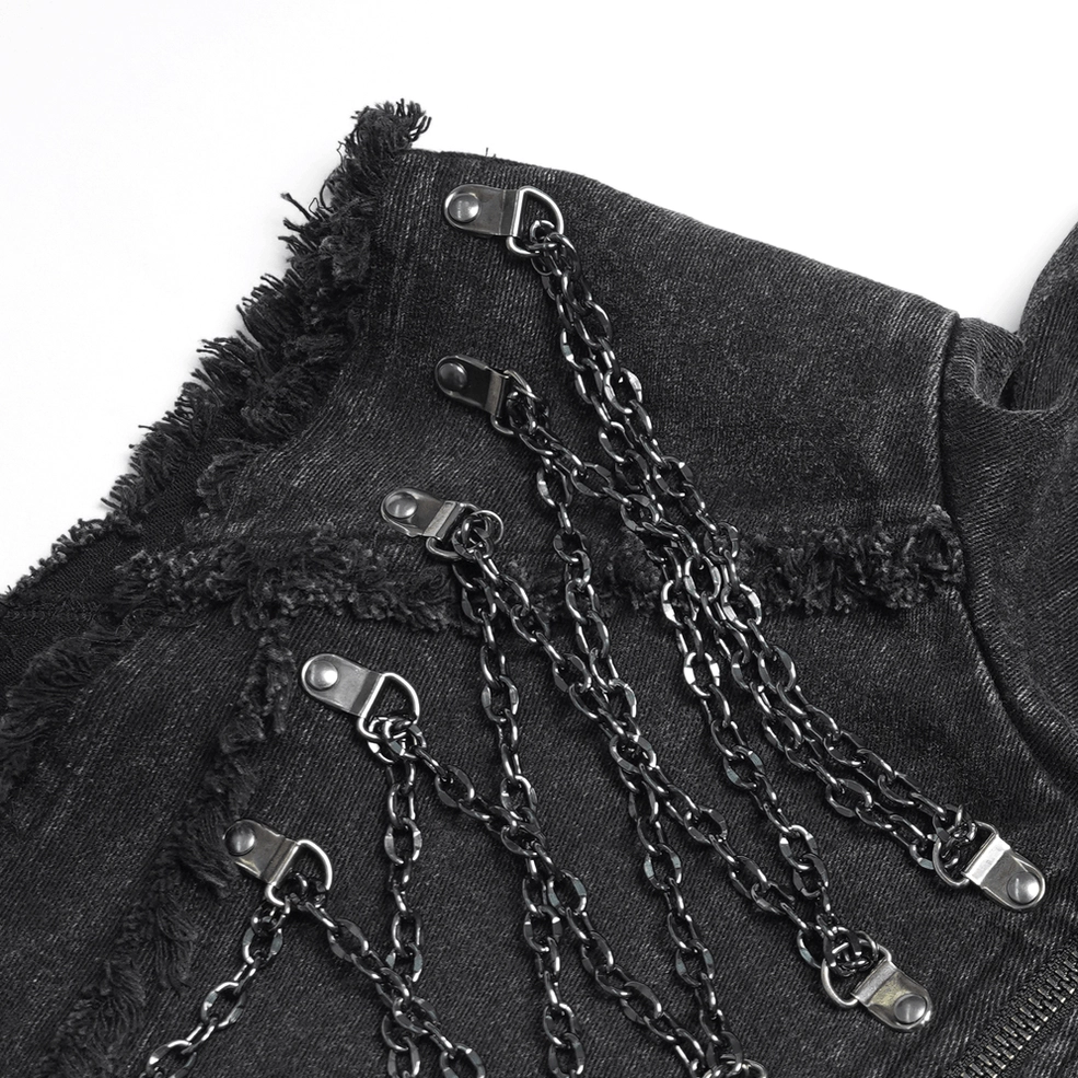 Macro close-up of metal chain fasteners and frayed black denim fabric texture on gothic chain vest