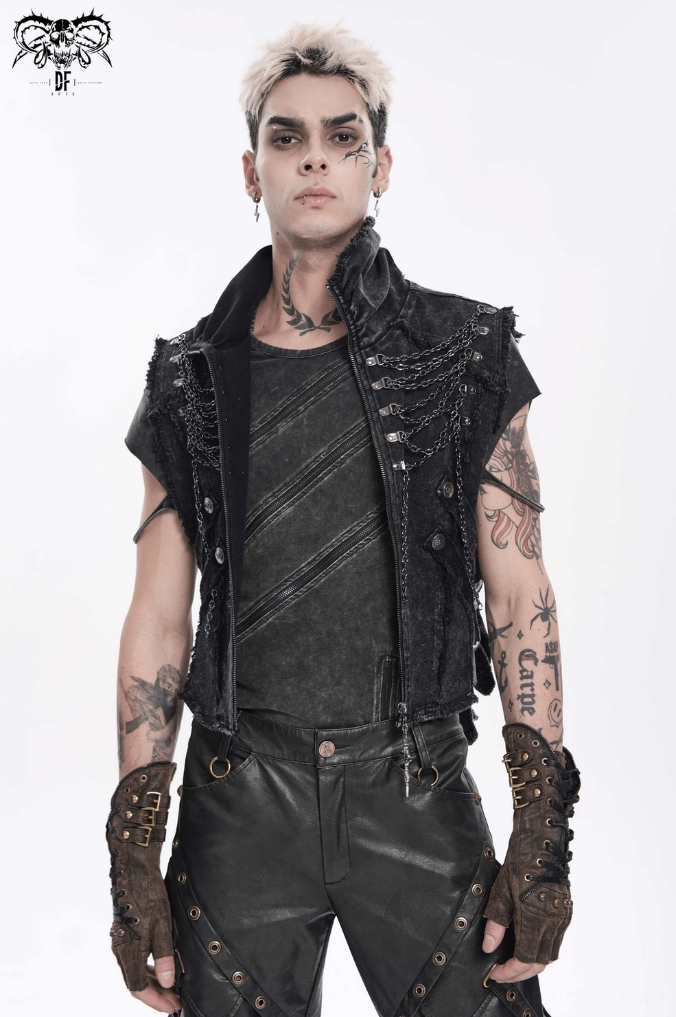 Three-quarter view of black gothic chain vest on tattooed male model showing chain placement and fit