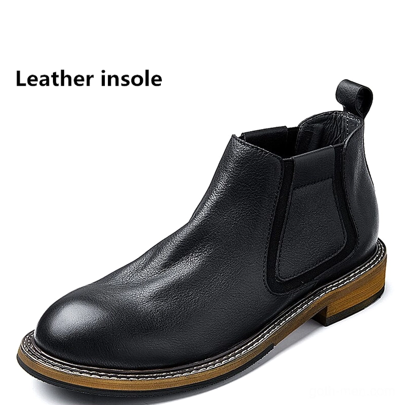 Single black leather Chelsea boot front view, soft leather upper with elastic side panels