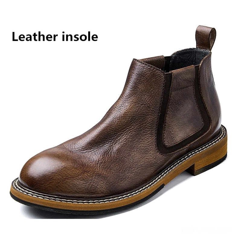 Single distressed brown leather Chelsea boot flat view, polished toe cap with stitched tan outsole