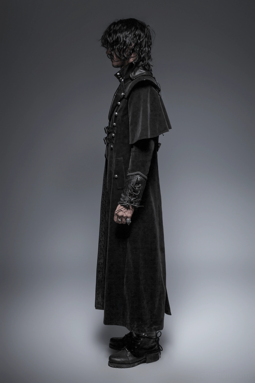 Men's gothic cloak styled with alternative fashion accessories demonstrating versatile styling potential