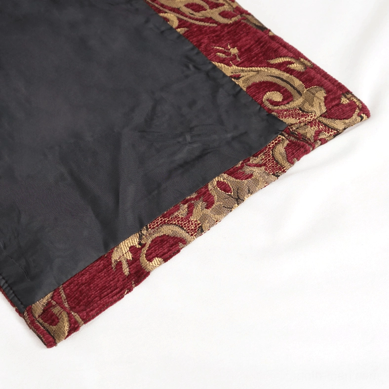 Close-up of gothic coat interior lining showing smooth black textile finish and damask outer fabric edge construction