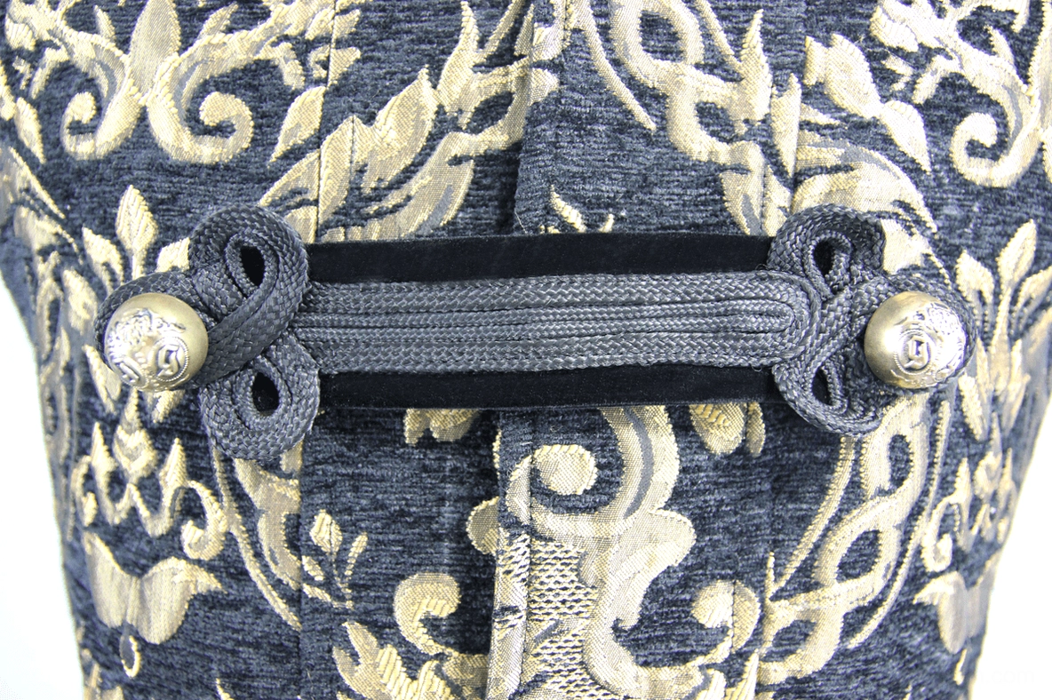 Dual frog buttons with velvet trim and gold damask fabric weave close-up on gothic sleeveless coat