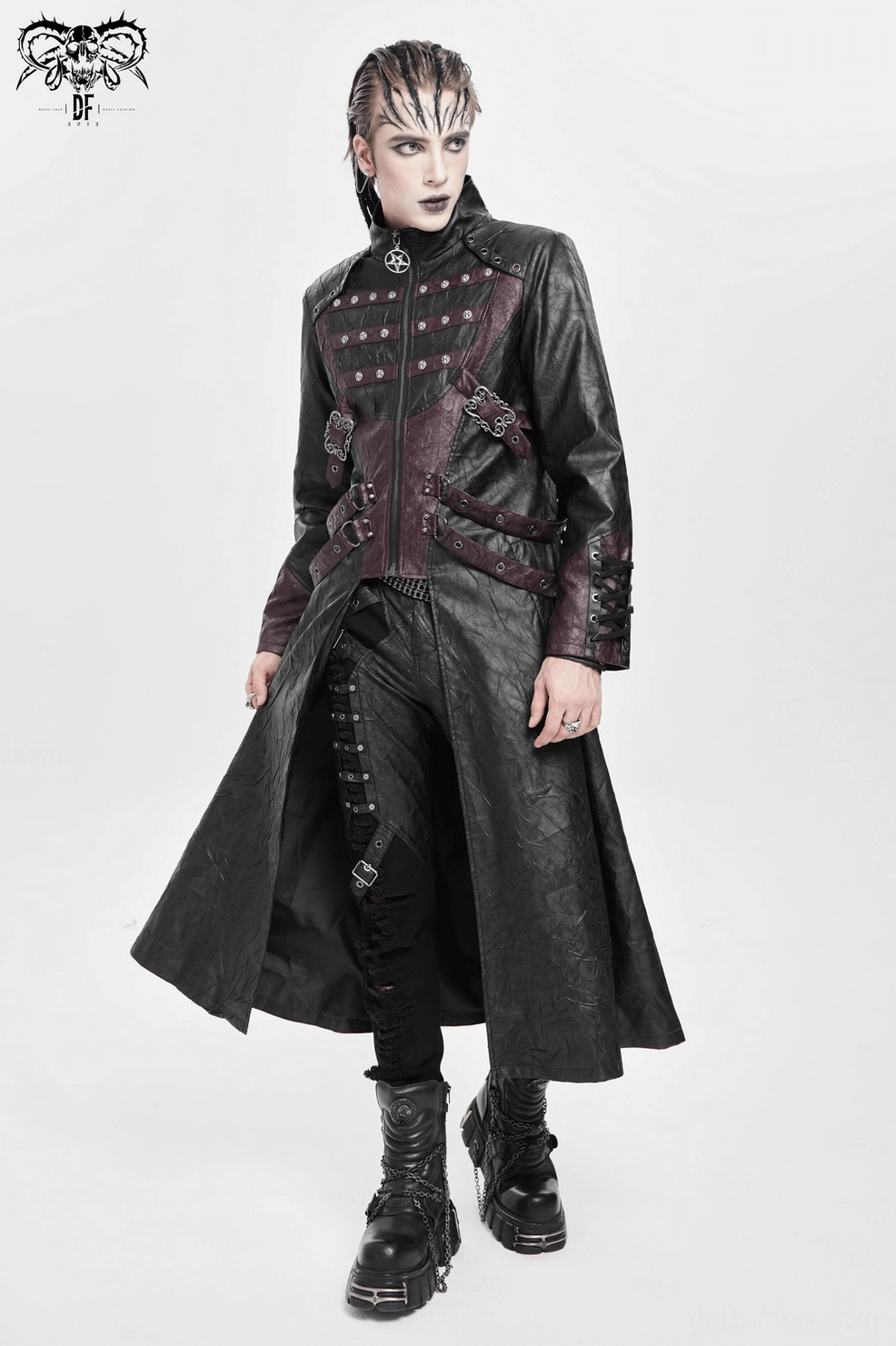 Gothic buckled coat front panels with functional metal hardware and architectural layered design on mannequin