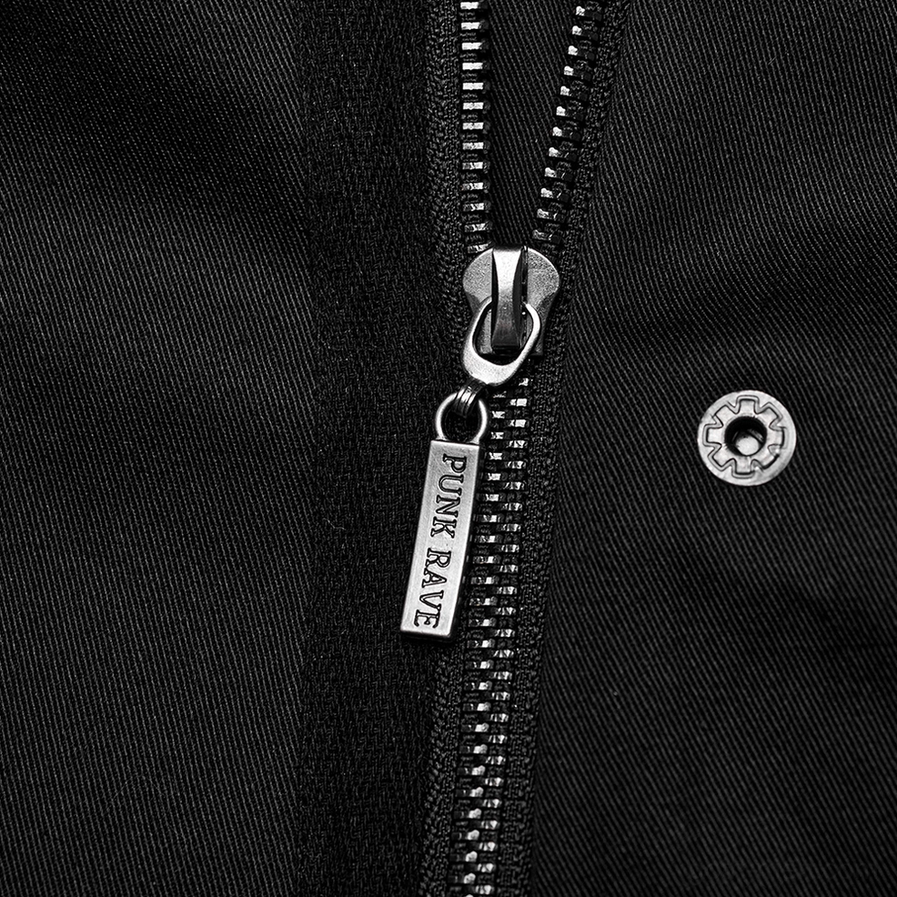 Macro close-up of metal zipper hardware with punk rave branding on twill fabric