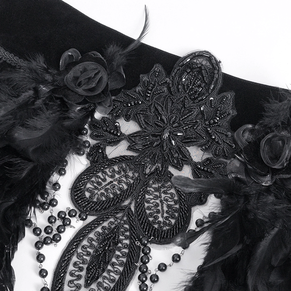 Intricate beading and embroidery detail of gothic collar with feather trims and decorative lace work