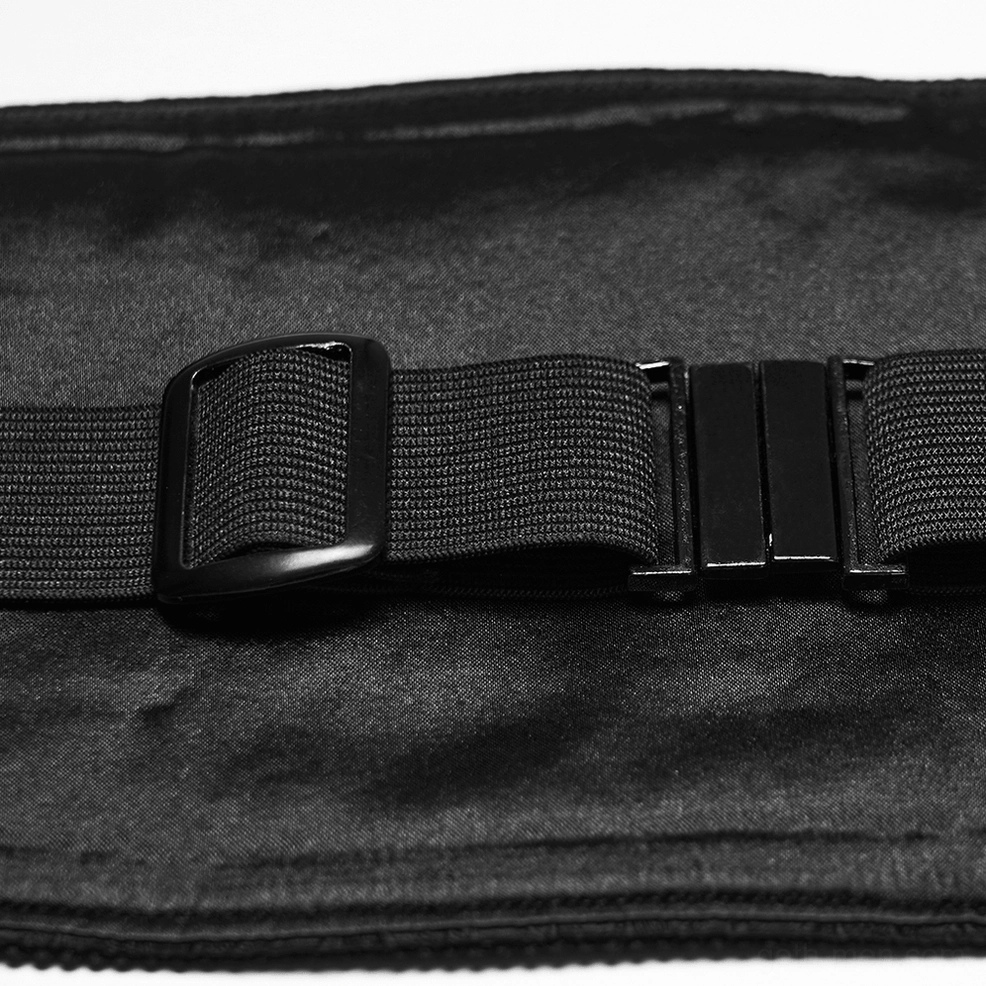 Interior close-up of black gothic waist belt showing satin inner lining, adjustable buckle clasp, and black hardware mechanism