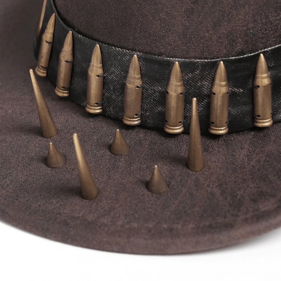 Close-up detail shot of brown gothic cowboy hat metal bullet band crown trim showing individual metallic casings and punk aesthetic