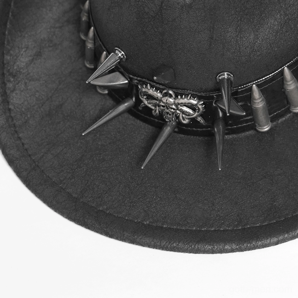 Close-up detail shot of metal spike and bullet stud embellishments on gothic cowboy hat brim trim