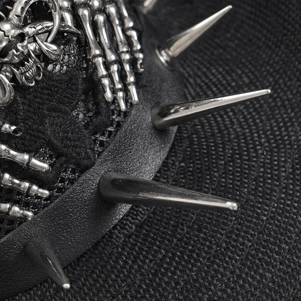 Dark gothic wide brim hat with skeleton hand appliqués and textured spike trim, detail shot