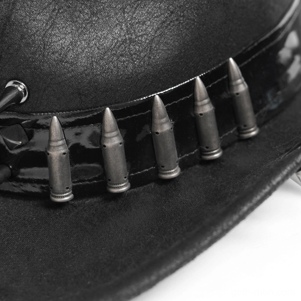 Black faux leather gothic cowboy hat featuring prominent metal skull and bullet decorations shown from fashion styling perspective