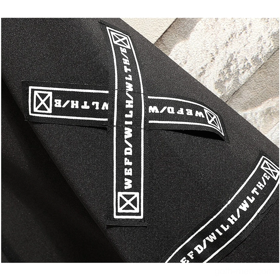 Black gothic cross coat front and side profile showing silhouette and drape