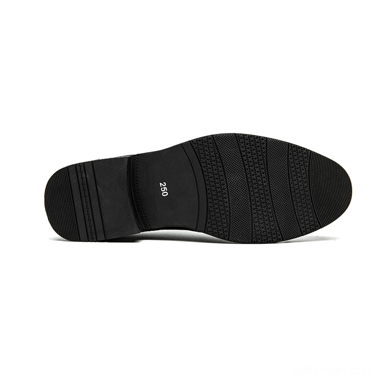 Black rubber outsole of gothic spiked derby shoe with tread pattern and size marking