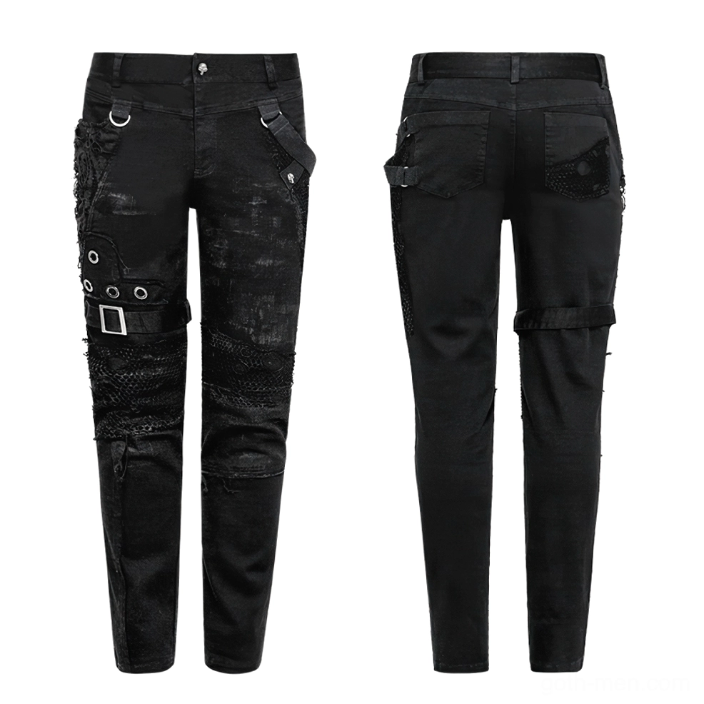 Flat lay front and rear view comparison of black gothic distressed jeans showing metal hardware and mesh fabric details