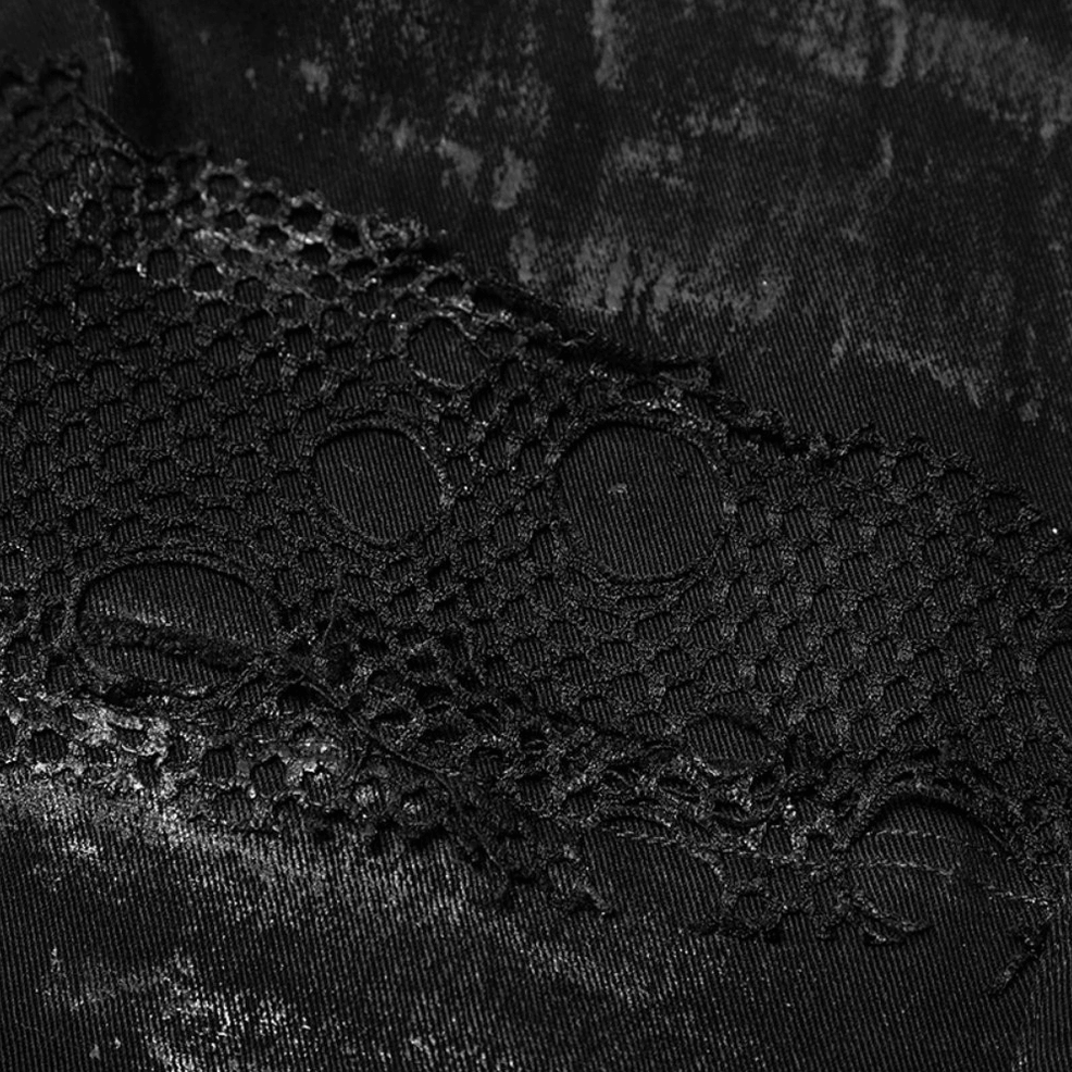 Alternative styling view of black gothic distressed jeans with mesh panels and metal reinforcement accents