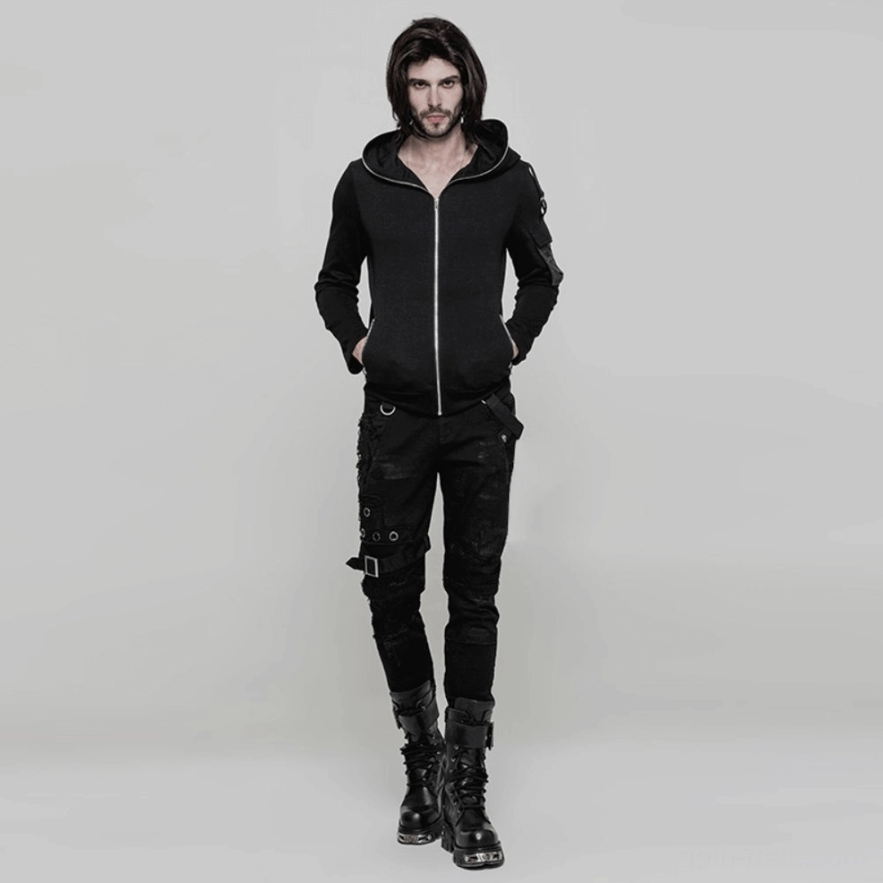 Three-quarter view of gothic distressed black jeans showing overall silhouette, fit and metal hardware placement