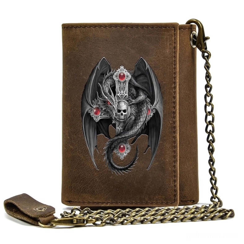 men's gothic leather wallet front flat lay featuring intricate dragon skull pattern and brass snap hasp closure on distressed brown leather