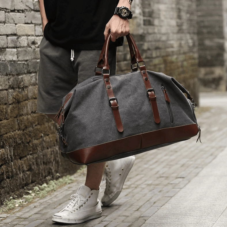 Gothic carry-on duffel bag packed for travel, demonstrating large capacity and organizational compartments