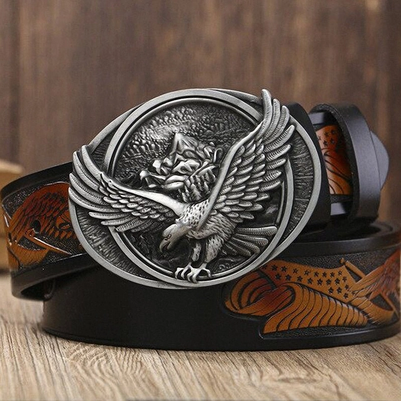 Silver-tone eagle metal buckle on black leather gothic belt with western-style embossments and reinforced stitching