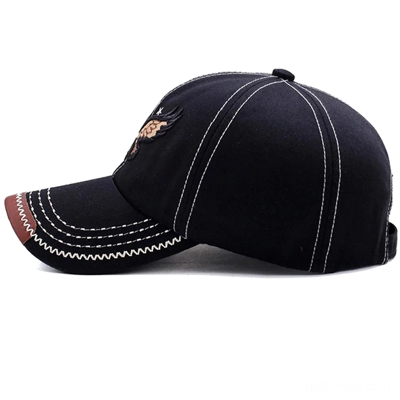 Side profile of black gothic eagle cap showing contrast panel stitching and faux leather brim accent