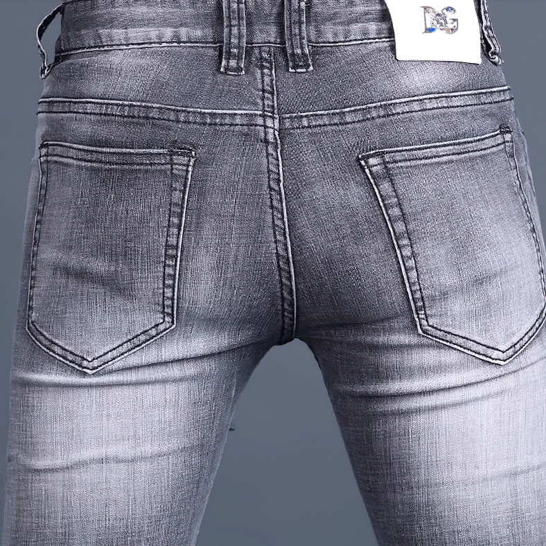 Men's gothic embroidered skinny jeans in grey denim showcasing alternative fashion and stretch fit construction