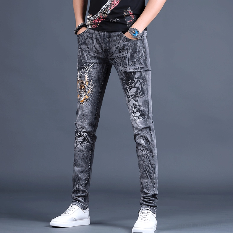 Front full view of men's gothic stretch skinny jeans in grey washed denim with thigh embroidery accent