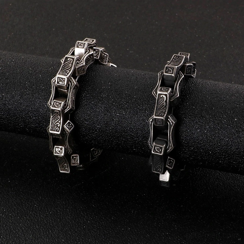 Antique style gothic engraved bracelets side view black velvet display
