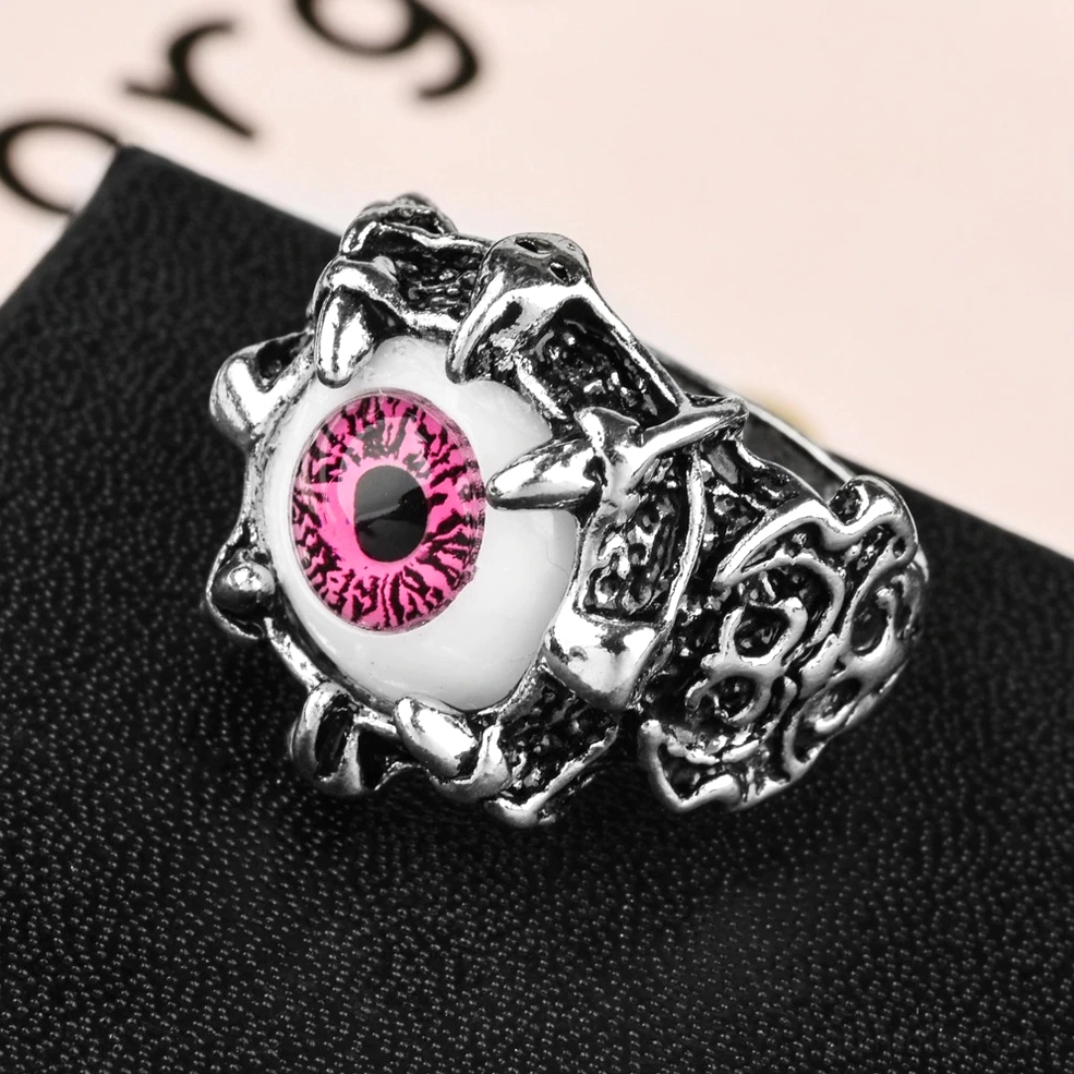 Gothic evil eye ring worn on hand, pink resin eye, vintage silver alloy, 20mm width detail
