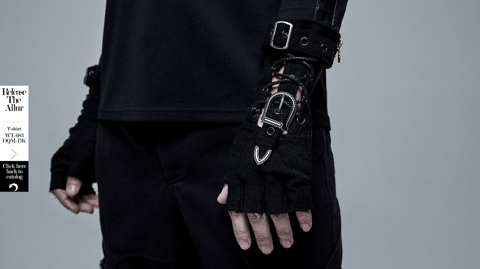 Rear view of male hand wearing black gothic fingerless glove showing back details and lace-up design