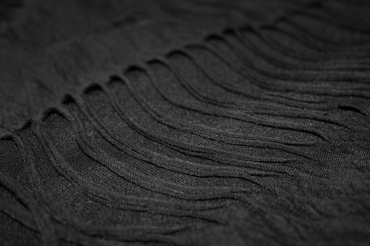 Men's gothic fringe t-shirt hem and side detail - layered fringe trim with distressed wave pattern on black cotton knit