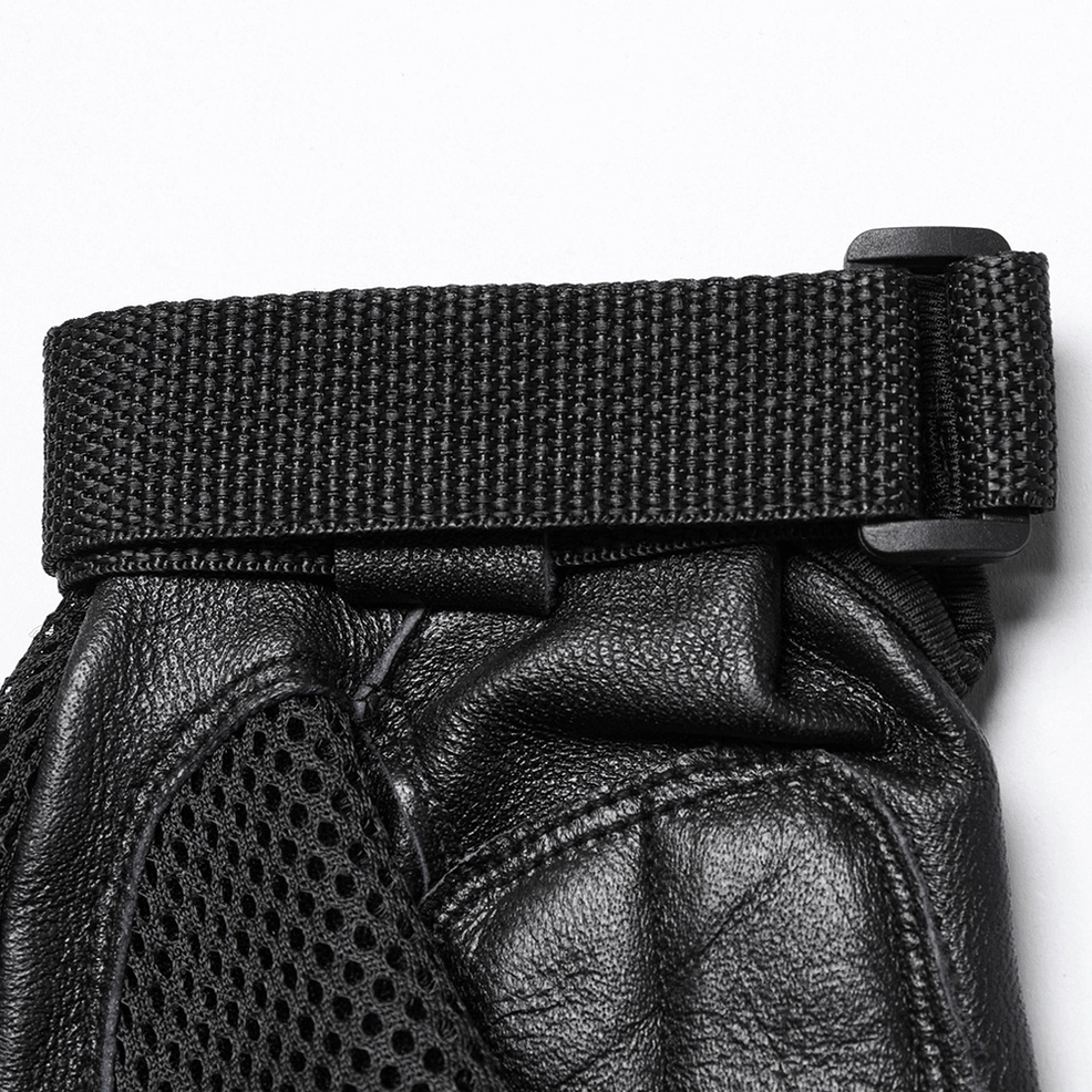 Side close-up detail of gothic fingerless glove wrist, displaying nylon webbing strap and breathable mesh fabric