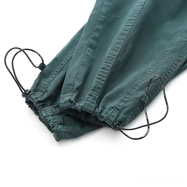 Gothic cargo harem pants front flat lay full view demonstrating loose fit and dropped crotch silhouette