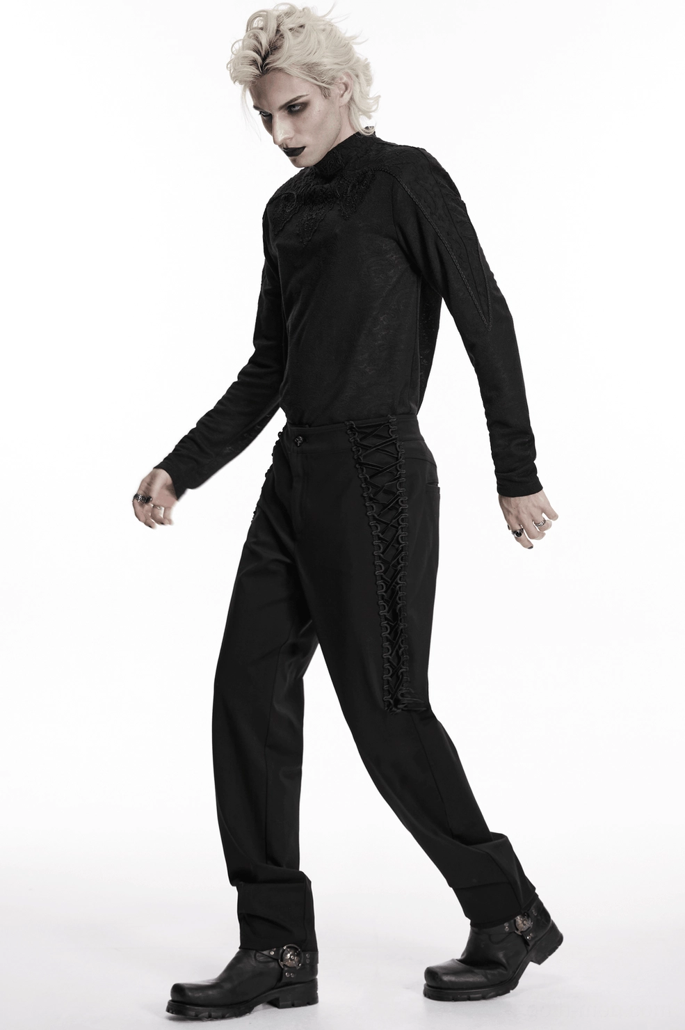 Product display of gothic high-waist black pants featuring the signature side lace-up straps and slim silhouette